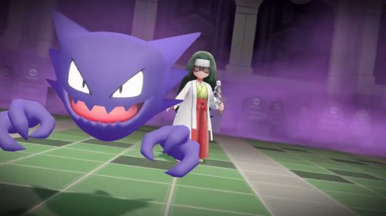 Um Haunter e um canalizador na Torre Lavender de Pokémon