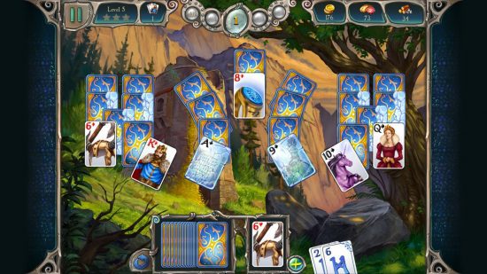 Uma das muitas maneiras de jogar Paciência no Switch e no celular, Avalon Legends Solitaire 2, mostrando várias cartas místicas em um fundo de uma paisagem fantástica.