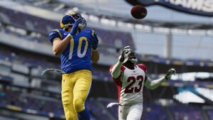 Player trying to catch a throw in Madden 23