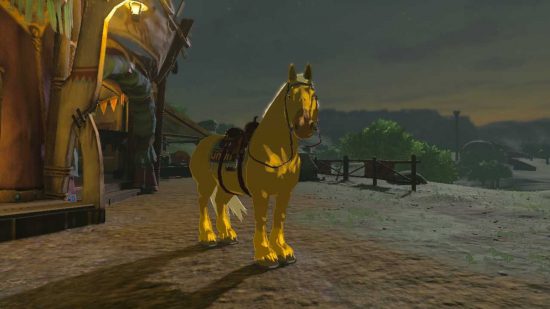 Zelda Tears of the Kingdom cavalo dourado do lado de fora de um estábulo