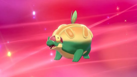 Evolução do Applin A evolução do Applin Appletun em um fundo rosa brilhante