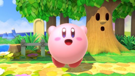 Melhores personagens não binários da Nintendo: Kirby.  A imagem mostra Kirby parado alegremente perto de Whispy Woods em Super Smash Bros. Ultimate.