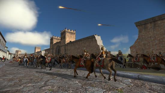 jogos-like-age-of-empires-rome-total-war Uma captura de tela de Rome Total War, mostrando soldados montados cercando um forte.