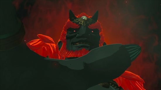 Um close-up de Zelda Tears of the Kingdom ganondorf em um fundo escuro em direção à câmera