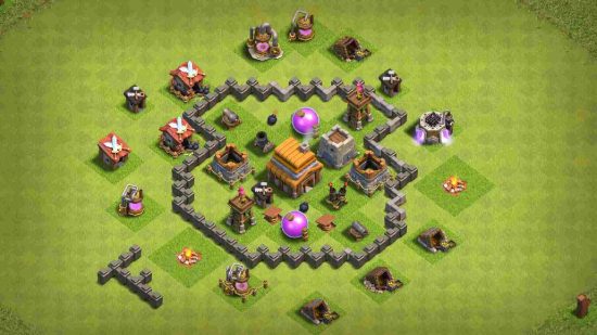bases de confronto de clãs Bases do Clash of Clans: uma captura de tela do jogo Clash of Clans mostra uma série de edifícios e fortalezas