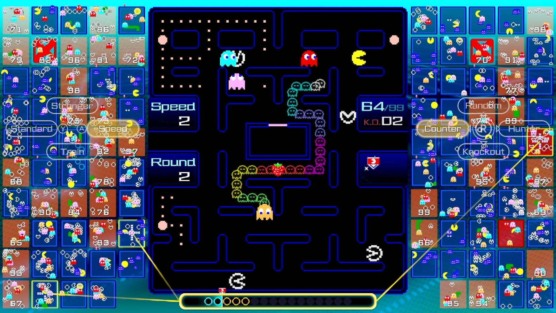 pac-man-99 Uma captura de tela de um dos melhores jogos do Pac-Man, Pac-Man 99