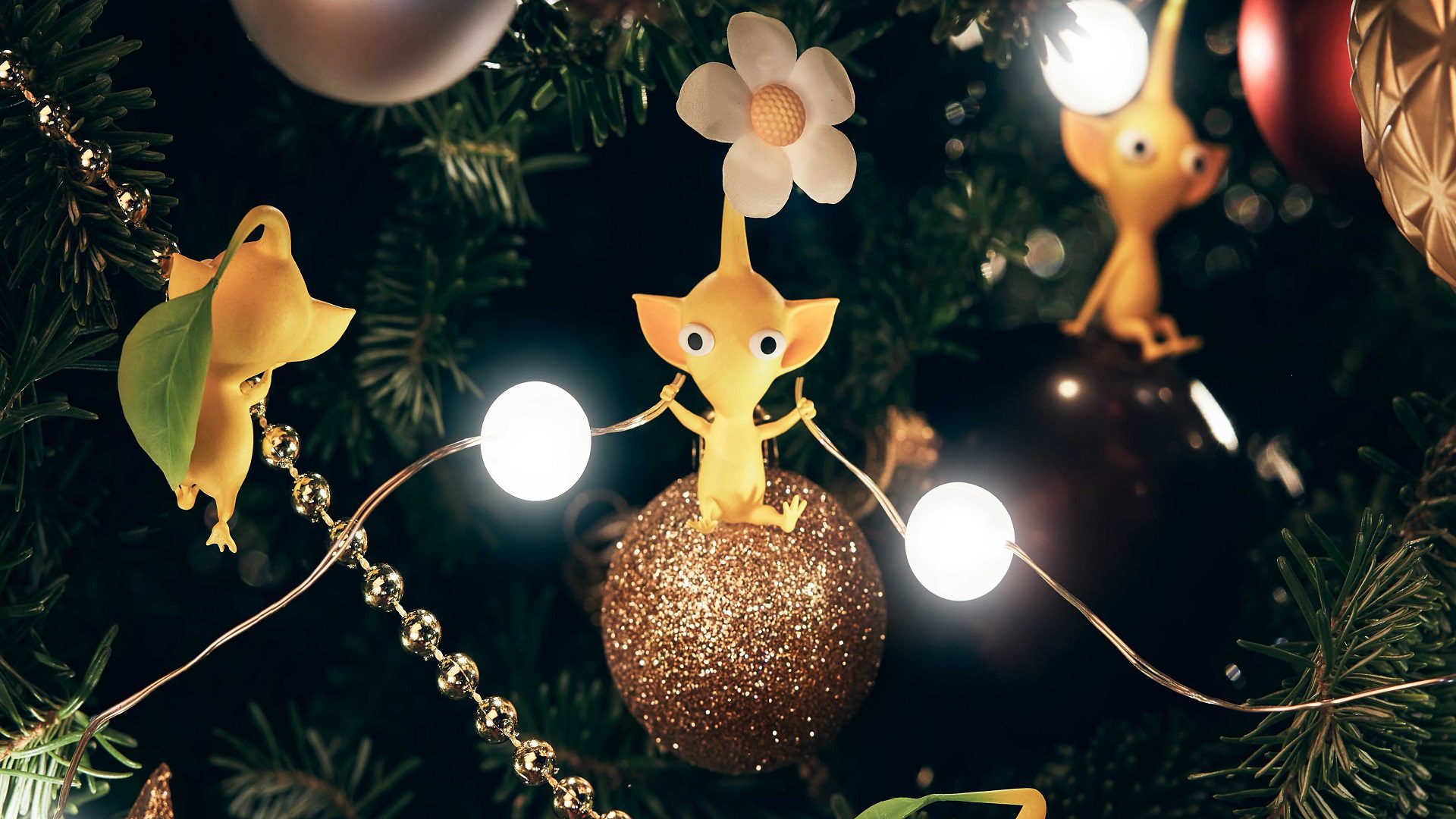 jogos-de-natal-9 Jogos de Natal - um Pikmin amarelo segurando luzes de Natal